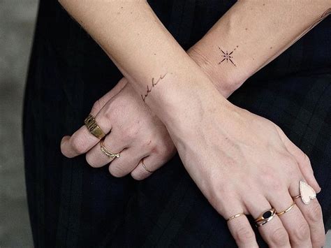 hand tattoo wrist|wrist meaningful minimalist tattoo.